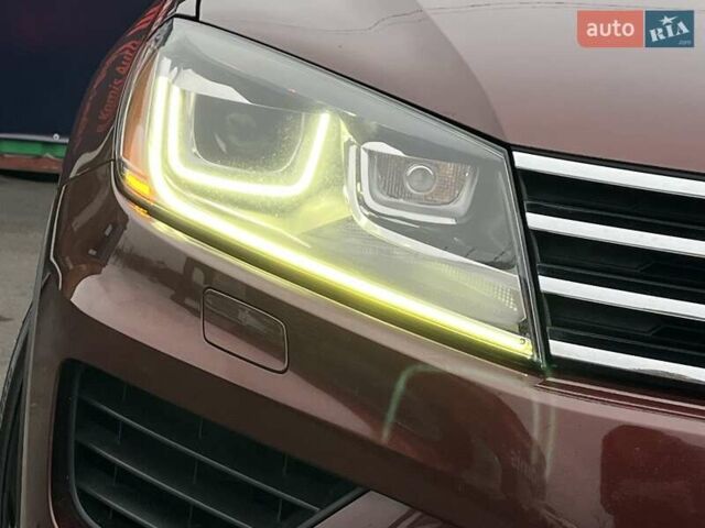 Красный Фольксваген Туарег, объемом двигателя 3.6 л и пробегом 189 тыс. км за 22649 $, фото 5 на Automoto.ua