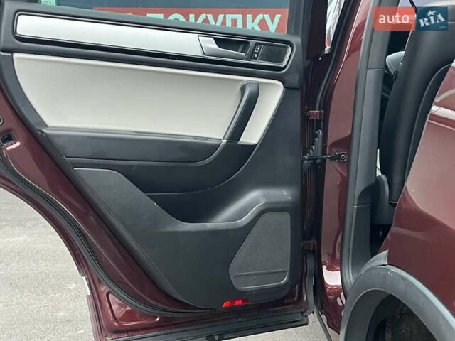 Красный Фольксваген Туарег, объемом двигателя 3.6 л и пробегом 189 тыс. км за 22649 $, фото 19 на Automoto.ua