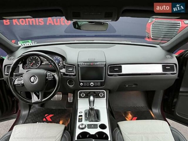 Красный Фольксваген Туарег, объемом двигателя 3.6 л и пробегом 189 тыс. км за 22649 $, фото 1 на Automoto.ua