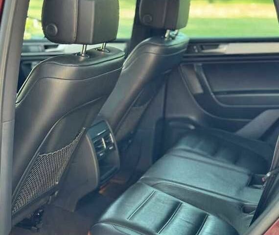 Красный Фольксваген Туарег, объемом двигателя 3.6 л и пробегом 75 тыс. км за 15000 $, фото 14 на Automoto.ua