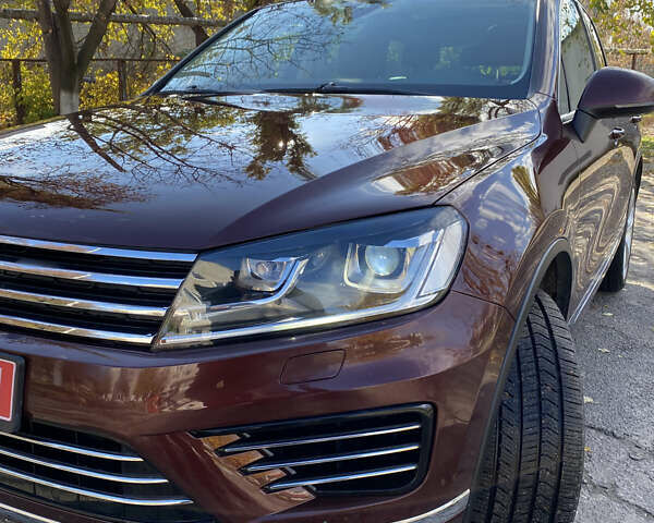 Красный Фольксваген Туарег, объемом двигателя 3.6 л и пробегом 127 тыс. км за 21500 $, фото 12 на Automoto.ua