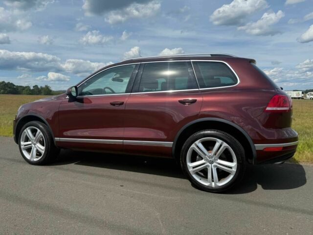 Красный Фольксваген Туарег, объемом двигателя 3.6 л и пробегом 51 тыс. км за 6200 $, фото 4 на Automoto.ua