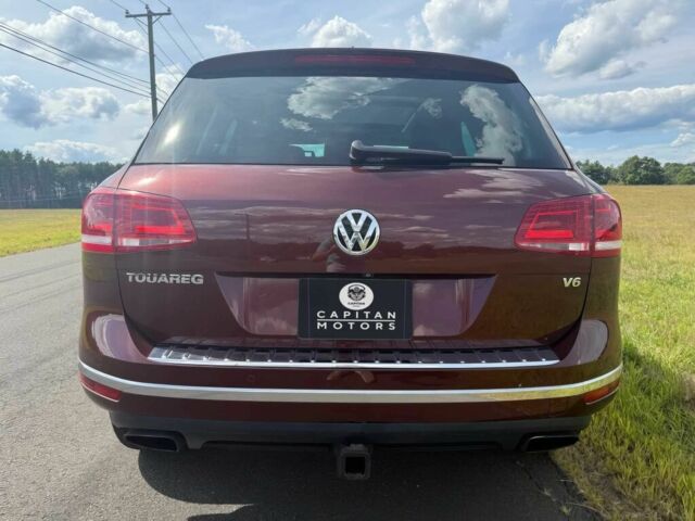 Красный Фольксваген Туарег, объемом двигателя 3.6 л и пробегом 51 тыс. км за 6200 $, фото 5 на Automoto.ua