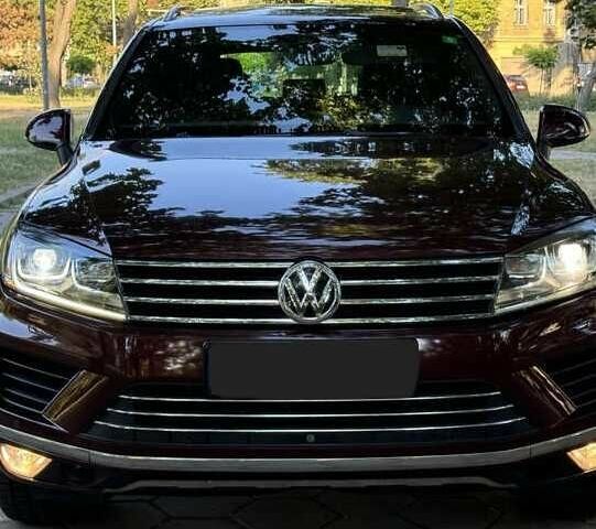 Красный Фольксваген Туарег, объемом двигателя 3.6 л и пробегом 75 тыс. км за 15000 $, фото 2 на Automoto.ua