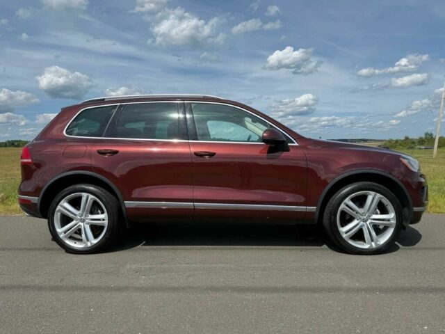 Красный Фольксваген Туарег, объемом двигателя 3.6 л и пробегом 51 тыс. км за 6200 $, фото 7 на Automoto.ua