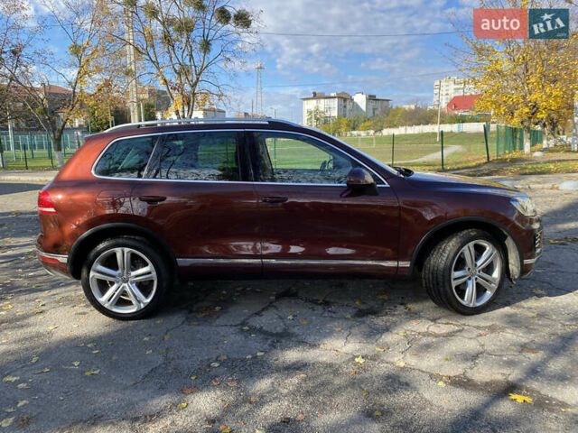 Красный Фольксваген Туарег, объемом двигателя 3.6 л и пробегом 127 тыс. км за 21500 $, фото 3 на Automoto.ua