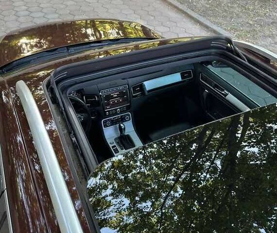 Красный Фольксваген Туарег, объемом двигателя 3.6 л и пробегом 75 тыс. км за 15000 $, фото 15 на Automoto.ua