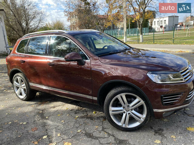 Красный Фольксваген Туарег, объемом двигателя 3.6 л и пробегом 127 тыс. км за 21500 $, фото 7 на Automoto.ua