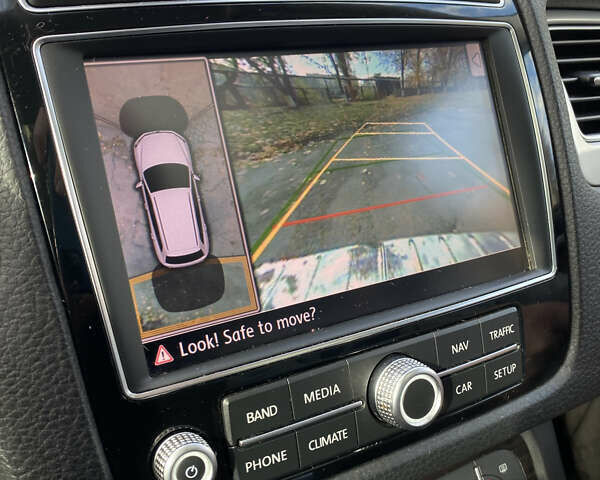 Красный Фольксваген Туарег, объемом двигателя 3.6 л и пробегом 127 тыс. км за 21500 $, фото 55 на Automoto.ua