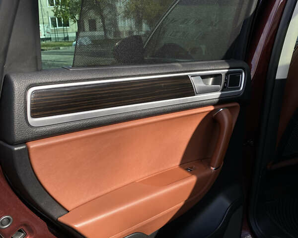 Красный Фольксваген Туарег, объемом двигателя 3.6 л и пробегом 127 тыс. км за 21500 $, фото 34 на Automoto.ua