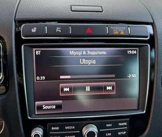 Красный Фольксваген Туарег, объемом двигателя 3.6 л и пробегом 75 тыс. км за 15000 $, фото 11 на Automoto.ua