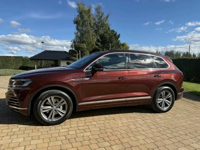 Красный Фольксваген Туарег, объемом двигателя 3 л и пробегом 40 тыс. км за 7800 $, фото 2 на Automoto.ua