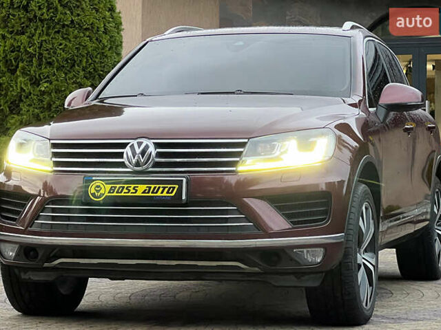 Красный Фольксваген Туарег, объемом двигателя 2.97 л и пробегом 191 тыс. км за 40500 $, фото 2 на Automoto.ua