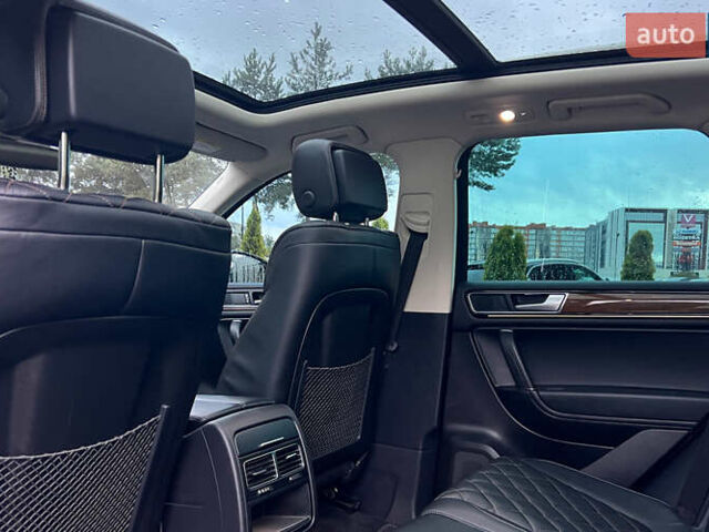 Красный Фольксваген Туарег, объемом двигателя 2.97 л и пробегом 191 тыс. км за 40500 $, фото 24 на Automoto.ua