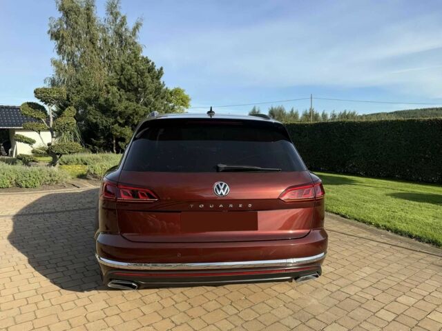 Красный Фольксваген Туарег, объемом двигателя 3 л и пробегом 40 тыс. км за 7800 $, фото 4 на Automoto.ua