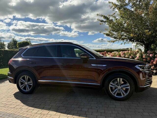 Красный Фольксваген Туарег, объемом двигателя 3 л и пробегом 40 тыс. км за 7800 $, фото 5 на Automoto.ua