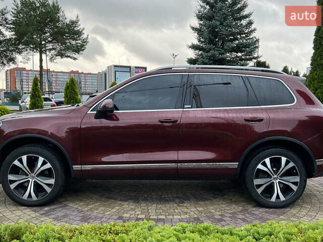 Красный Фольксваген Туарег, объемом двигателя 2.97 л и пробегом 191 тыс. км за 40500 $, фото 3 на Automoto.ua