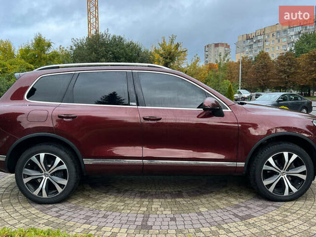 Красный Фольксваген Туарег, объемом двигателя 2.97 л и пробегом 191 тыс. км за 40500 $, фото 7 на Automoto.ua