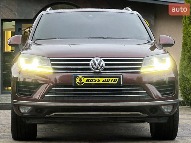 Красный Фольксваген Туарег, объемом двигателя 2.97 л и пробегом 191 тыс. км за 40500 $, фото 1 на Automoto.ua