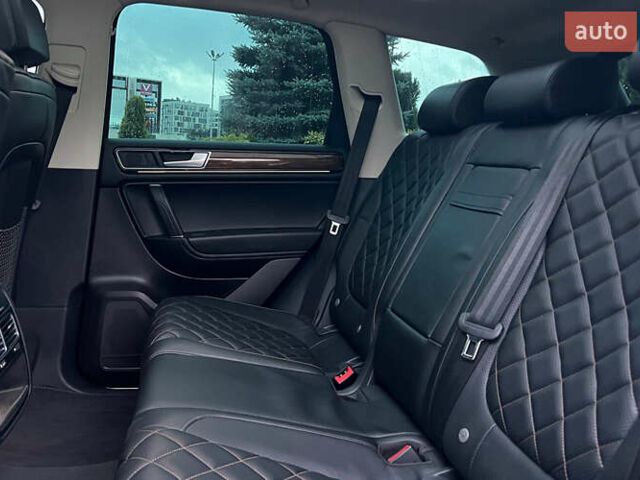 Красный Фольксваген Туарег, объемом двигателя 2.97 л и пробегом 191 тыс. км за 40500 $, фото 25 на Automoto.ua