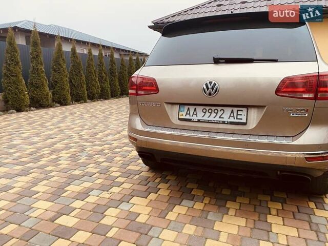 Желтый Фольксваген Туарег, объемом двигателя 3 л и пробегом 239 тыс. км за 32000 $, фото 4 на Automoto.ua