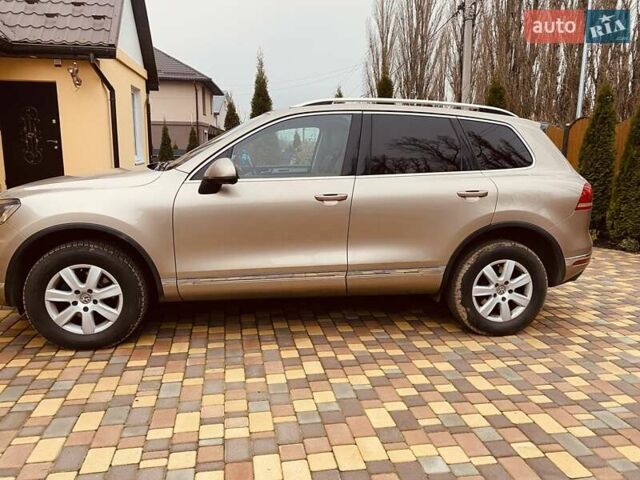 Желтый Фольксваген Туарег, объемом двигателя 3 л и пробегом 239 тыс. км за 32000 $, фото 3 на Automoto.ua