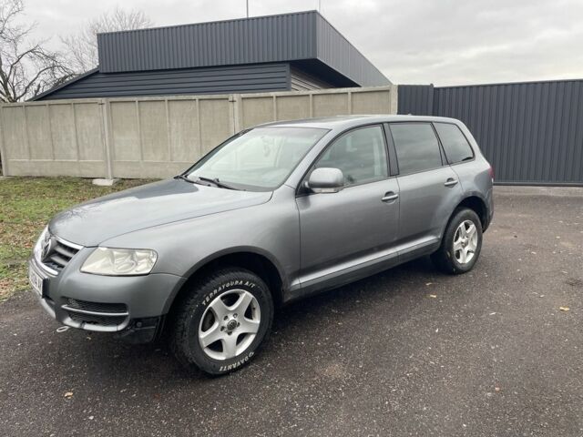 Сірий Фольксваген Туарег, об'ємом двигуна 2.5 л та пробігом 320 тис. км за 4500 $, фото 1 на Automoto.ua