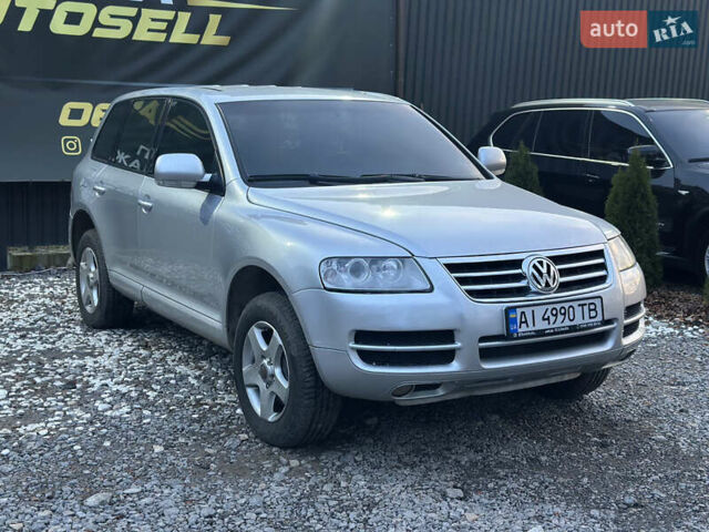 Серый Фольксваген Туарег, объемом двигателя 3.19 л и пробегом 350 тыс. км за 5700 $, фото 1 на Automoto.ua
