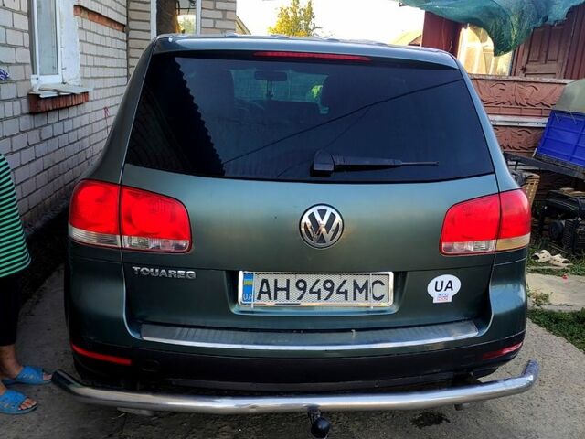 Серый Фольксваген Туарег, объемом двигателя 4.9 л и пробегом 260 тыс. км за 6000 $, фото 6 на Automoto.ua