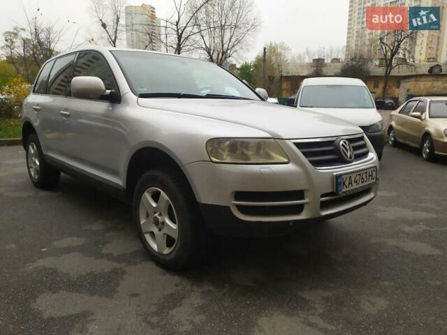 Серый Фольксваген Туарег, объемом двигателя 2.46 л и пробегом 300 тыс. км за 7499 $, фото 7 на Automoto.ua