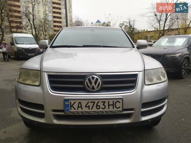 Серый Фольксваген Туарег, объемом двигателя 2.46 л и пробегом 300 тыс. км за 7499 $, фото 8 на Automoto.ua