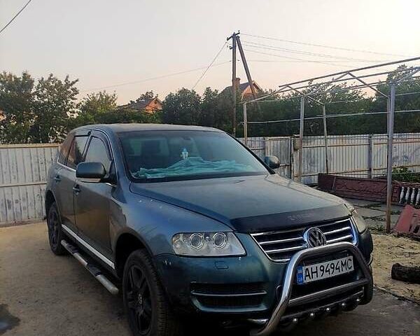 Серый Фольксваген Туарег, объемом двигателя 4.9 л и пробегом 260 тыс. км за 6000 $, фото 9 на Automoto.ua