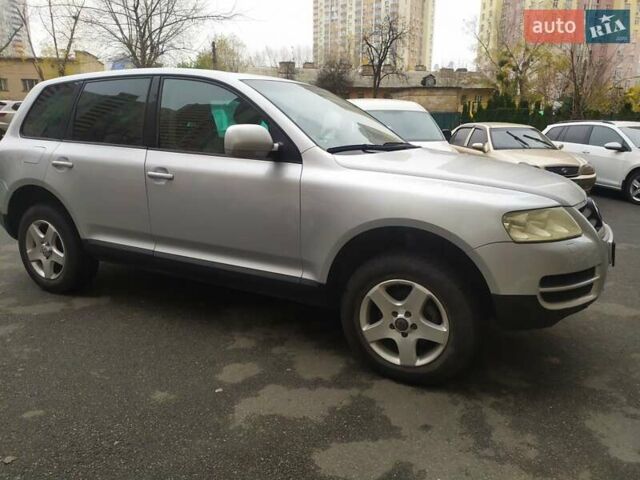 Серый Фольксваген Туарег, объемом двигателя 2.46 л и пробегом 300 тыс. км за 7499 $, фото 6 на Automoto.ua