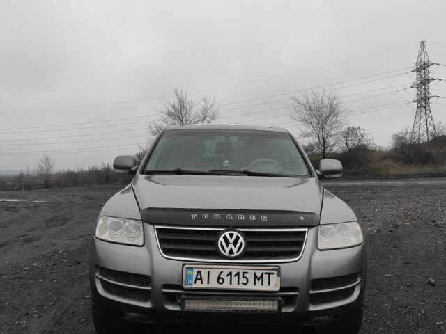 Серый Фольксваген Туарег, объемом двигателя 3.2 л и пробегом 219 тыс. км за 7300 $, фото 1 на Automoto.ua