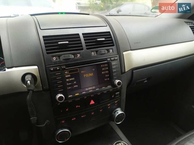 Серый Фольксваген Туарег, объемом двигателя 2.46 л и пробегом 300 тыс. км за 7499 $, фото 22 на Automoto.ua