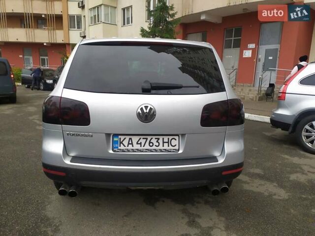 Серый Фольксваген Туарег, объемом двигателя 2.46 л и пробегом 300 тыс. км за 7499 $, фото 3 на Automoto.ua