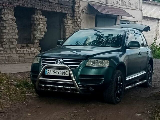 Серый Фольксваген Туарег, объемом двигателя 4.9 л и пробегом 260 тыс. км за 6000 $, фото 1 на Automoto.ua