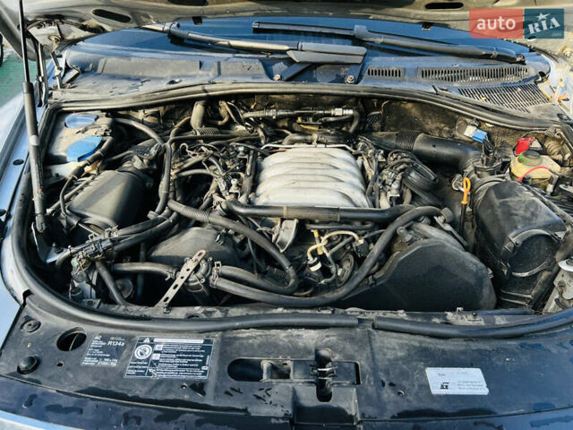 Серый Фольксваген Туарег, объемом двигателя 4.2 л и пробегом 310 тыс. км за 7400 $, фото 6 на Automoto.ua