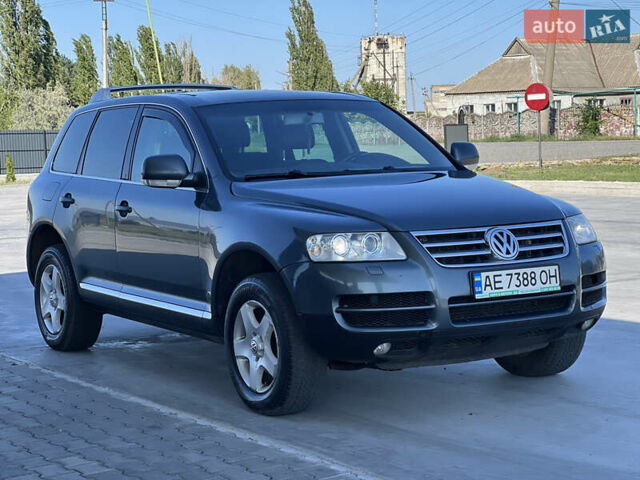 Сірий Фольксваген Туарег, об'ємом двигуна 2.46 л та пробігом 330 тис. км за 5500 $, фото 4 на Automoto.ua