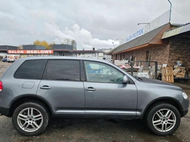 Серый Фольксваген Туарег, объемом двигателя 2.5 л и пробегом 296 тыс. км за 2600 $, фото 3 на Automoto.ua