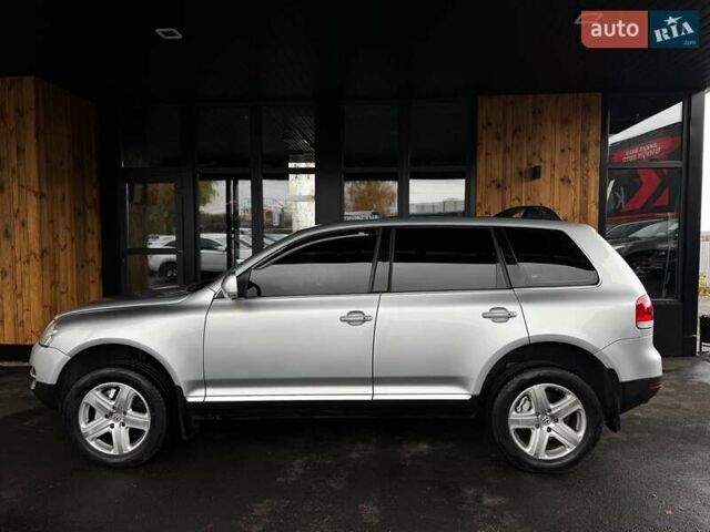 Серый Фольксваген Туарег, объемом двигателя 4.2 л и пробегом 309 тыс. км за 6999 $, фото 4 на Automoto.ua