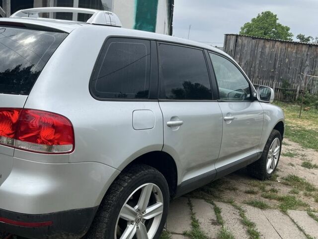 Серый Фольксваген Туарег, объемом двигателя 3 л и пробегом 400 тыс. км за 9000 $, фото 6 на Automoto.ua