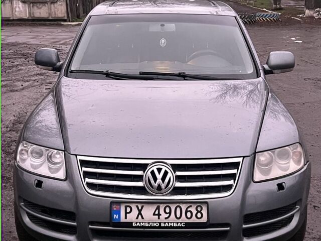 Серый Фольксваген Туарег, объемом двигателя 2.5 л и пробегом 350 тыс. км за 4700 $, фото 1 на Automoto.ua