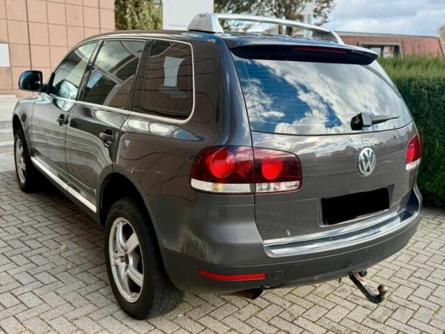 Серый Фольксваген Туарег, объемом двигателя 3 л и пробегом 213 тыс. км за 3455 $, фото 3 на Automoto.ua