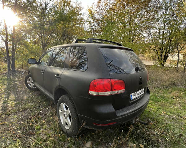 Серый Фольксваген Туарег, объемом двигателя 2.5 л и пробегом 313 тыс. км за 6000 $, фото 5 на Automoto.ua