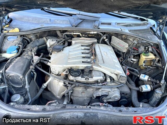 Серый Фольксваген Туарег, объемом двигателя 3.2 л и пробегом 308 тыс. км за 9500 $, фото 6 на Automoto.ua