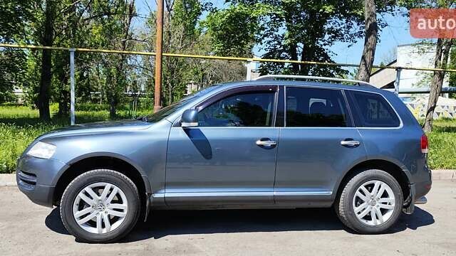 Серый Фольксваген Туарег, объемом двигателя 3.19 л и пробегом 503 тыс. км за 7700 $, фото 5 на Automoto.ua