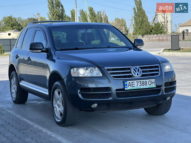 Сірий Фольксваген Туарег, об'ємом двигуна 2.46 л та пробігом 330 тис. км за 5500 $, фото 1 на Automoto.ua