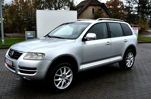 Серый Фольксваген Туарег, объемом двигателя 2 л и пробегом 1 тыс. км за 3200 $, фото 2 на Automoto.ua