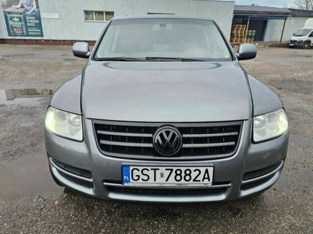 Серый Фольксваген Туарег, объемом двигателя 2.5 л и пробегом 296 тыс. км за 2600 $, фото 4 на Automoto.ua